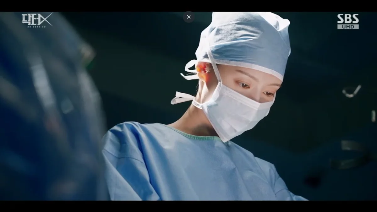 Kim Ji-won Goes Solo in Surgery as Son Hyun-joo Asks If She Is 'Doctor X' in Episode 8 cover